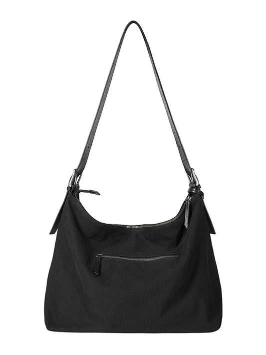 ARCcc segmented 16-inch black PU crossbody bag back white background